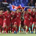 Jugadoras de Corea del Norte celebran el título