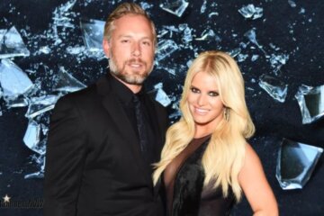 Jessica Simpson y Eric Johnson posando en una gala